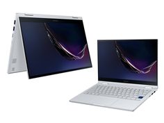 two laptops side by side with the same image on them, one is white and the other is silver