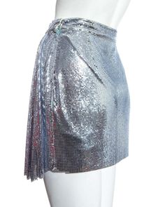 For Sale on 1stdibs - Gianni Versace metallic blue Oroton chainmail draped evening mini skirt. Fall-Winter 1994 Metal Skirt, Silver Mini Skirt For Evening And Party Season, Silver Mini Skirt For Evening Party Season, Vintage Mini Skirt, Silver Mini Skirt For Evening Parties, Chainmail Skirt, Silver Sequined Mini Skirt For Evening, Versace Chain Mail Dress, Versace Metallic Skirt