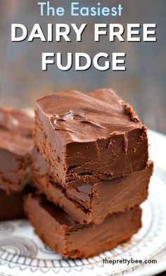 three pieces of chocolate fudge stacked on top of each other with the words, the easyest dairy free fudge