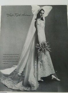 an old photo of a woman in a wedding dress