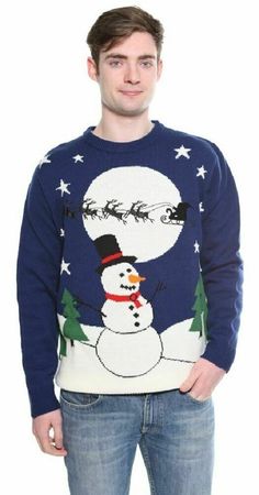 a man wearing a christmas sweater with a snowman on it's chest, standing in front of a white background