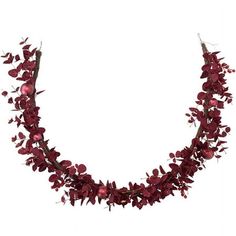 a necklace with red flowers and leaves on it