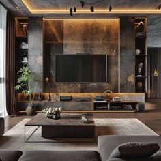 a modern living room with black and gold accents, large tv on the wall, leather couches and coffee table