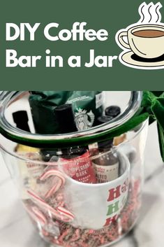 a cup filled with coffee and candy canes next to a sign that says diy coffee bar in a jar