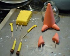 some food is laying out on a baking sheet and ready to be made into fondant