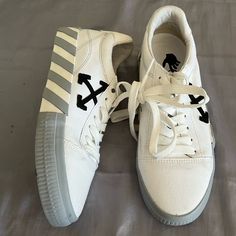 Womens Off White Vulcanized Lowtop Sneakers Shoes 39. Us 9. True To Size. No Box. Note; Sku Numbers On Bottom Right Sole To Secure No Retail Return For Full Value. May Have Light Surface Wear From Being Handled And Listed As Preowned But Shoes Were A Display. Never Worn Outside. Gently Handled And Tried On In Store. Smoke And Pet Free Home. Final Sale. Guaranteed Authentic. Specs; Off- White Vulcanized Lowtop Sneakers Shoes. Showcasing Off-White Affinity For Streetwear Style These Low Top Vulcan White Canvas Platform Sneakers With Laces, White Canvas Slip-on High-top Sneakers, Urban Custom Sneakers With Vulcanized Sole, White Urban Platform Sneakers For Streetwear, Modern White Skate Shoes For Streetwear, Urban White Platform Sneakers With Rubber Sole, White Vulcanized Sole Canvas Shoes For Streetwear, Urban White High-top Sneakers With Contrast Sole, Urban White Custom Sneakers With Laces