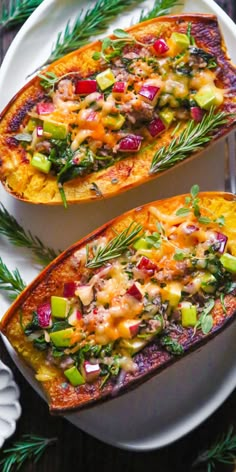 Stuffed Spaghetti Squash with spicy Italian Sausage, Spinach, Apples, Cheddar, and Pepper Jack Cheese on a white platter. Italian Sausage Spinach, Sausage And Spaghetti Squash, Spicy Italian Sausage, Sausage Spinach, Pepper Jack Cheese