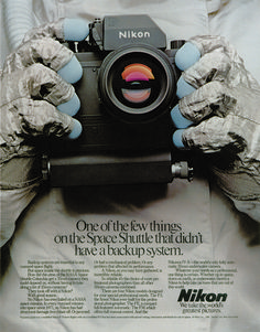 an advertisement for the nikon one of the few things on the space shuttle that didn't have a backup system