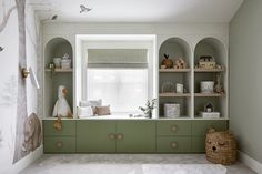 a child's room with shelves and stuffed animals