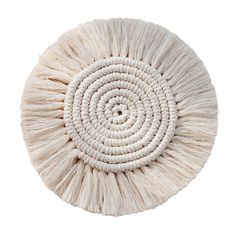 a white round rug on a white background