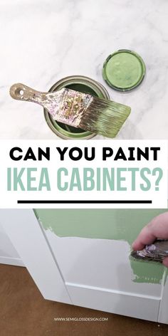 someone is painting the cabinets with green paint