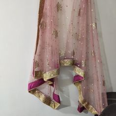 This Bridal Dupatta is sequin embroidered on net with beautiful golden border. This can be your wedding dress chunni for Indian occasion wear for festival. This has perfect bling for you to look classy and ethnic at same time. We can make in other colors.Pair it up with skirt and blouse from our shop.NOTE : There might be slight color variation due to different colour settings. Wedding Head Wrap, Dupatta Designs Ideas, Embroidery Scarf, Lehenga Dupatta, Indian Skirt, Indian Lehenga Choli, Bridal Dupatta, Punjabi Dress, Embroidered Scarf