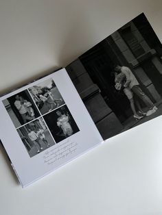 an open book with black and white photos on it's cover, showing people hugging each other