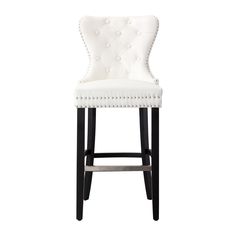 a white bar stool with studding on the back