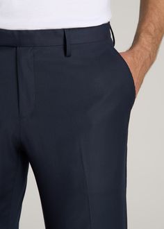 About Our Suit Trousers for Tall Men Crisp, classic and comfortable. That’s what you’ll find in these suit trousers for tall men. Thoughtfully designed for men from 6’ to 7’1, these pants have an extended inseam for longer legs without the extra bagginess you usually find in a longer pant. They’re made with a slightly stretchy polyester blend and feature a comfortable cotton-blend lining. These men’s tall pants feature a tailored fit for a modern look that’s easy to wear from the office to the e Slacks Outfit, Mens Suit Trousers, Scrubs Dress, Fitted Slacks, Longer Legs, Tall Men, Fitted Dress Pants, Tall Pants, Navy Suit