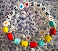 Niall Horan bracelet inspo!!⭐️ Niall Horan Bracelet, One Direction Book, Niall Horan Tour, Concert Bracelets, Music Album Design, Concert Ideas, Music Album Art, Clay Bead Bracelet, Bracelet Inspo