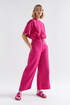 Anneli Light Wide Leg Linen Pant Model Angled Front | BRIGHT PINK Linen Pant, Simple Tees, Cuff Detail, Perfect Wardrobe, Wide Leg Pant, Wide Cuff, French Linen, Linen Pants, Best Seller