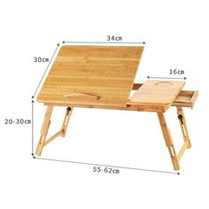 a wooden desk with a laptop on it and measurements for the table top, side by side