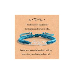 a blue and white bracelet with the words, this bracelet stands for the high and lows in life