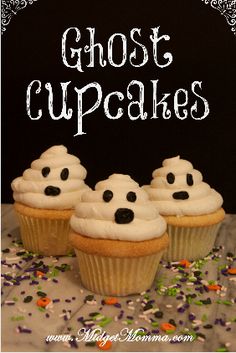 three cupcakes with white frosting and sprinkles in front of a black background