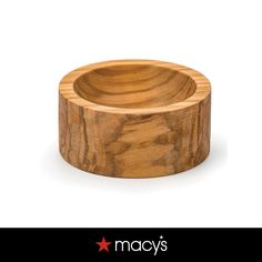 a small wooden bowl sitting on top of a table