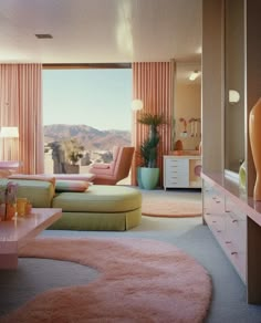 a living room filled with lots of furniture and pink carpeted flooring next to a large window