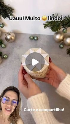 a woman holding up a bowl with christmas decorations around her and the caption that reads,