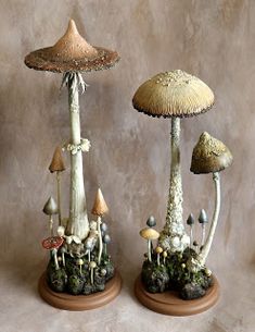 two mushroom sculptures sitting on top of each other