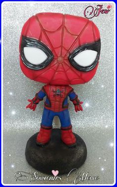 a spider man figurine is on display