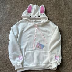 Adorable Kawaii Bunny Hoodie. Creamy White With Pink Accents And Soft Pink Ribbon. Purchased From Overseas But Was Too Small. It Has An Xl Tag But It’s More Of A Medium. R Tree His Is A Woman’s Size Shirt. Their Products Run Small. Not High End Quality So I’m Throwing In Some. Ute Kawaii Earrings, Too. Nwot. Never Worn. Kawaii Long Sleeve Sweatshirt For Spring, Spring Kawaii Long Sleeve Sweatshirt, Spring Long Sleeve Kawaii Sweatshirt, Cute White Long Sleeve Sweatshirt, Spring Kawaii Crew Neck Hoodie, White Kawaii Sweatshirt For Fall, Playful Hoodie Sweatshirt For Spring, White Harajuku Sweatshirt With Drawstring Hood, Harajuku White Sweatshirt With Drawstring Hood