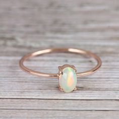 ⚫ This ring made with genuine opal in solid 14k rose gold, ⚫ Solid 14k Gold Gemstone Opal Ring Handmade Pure Gold Jewelry. ⚫ Opal Ring, Engagement Ring, Wedding Bands, Gold Ring, Gemstone Ring ⚫ Special customize for Anniversary, Birthday Gift, Valentine, Mother's Day Christmas. ⚫ Item Details: Gross Weight :- 0.89 Grams 14k Rose Gold Weight :- 0.85 Grams Opal Weight:- 0.19 Carats Ring Size 7 ( can be customized) Item SKU: YTR-2210 ⚫ SIZING -All rings can be made to any size that you wishes from Victorian Rings Vintage, Ear Wrap Earrings, Rose Gold Opal Ring, Pure Gold Jewellery, Ring Rosegold, Jewelry Opal, Ethiopian Opal Ring, Opal Ring Gold, Handmade Fine Jewelry