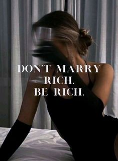 a woman sitting on top of a bed next to a window with the words don't marry rich be rich