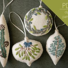 three ornaments are hanging from strings on a table with text overlay that reads pdd digital pattern library