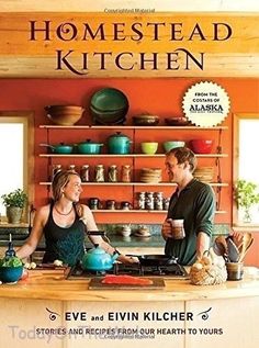 a man and woman standing in front of a kitchen counter with pots and pans on it