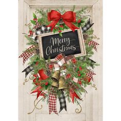 a merry christmas wreath with bells and bows