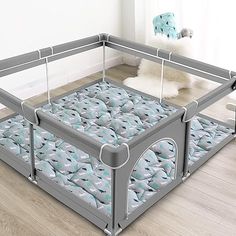 a baby crib that is on the floor