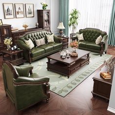 a living room filled with green couches and wooden furniture on top of a hard wood floor