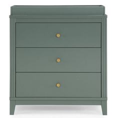 a green dresser with three drawers and two gold knobs on the bottom, against a white background