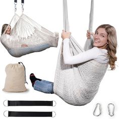 a woman sitting in a hammock with two straps