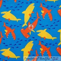 a blue background with orange and yellow sharks on it, one ring is in the middle