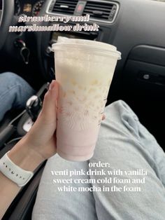 a person holding up a pink drink in their hand with the caption, order ventt pink drink with vanilla sweet cream cold foam and white mocha in the foam