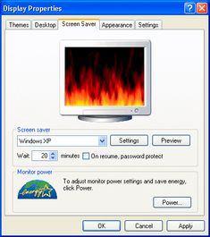 an image of a computer screen with fire on the monitor and text that reads display properties