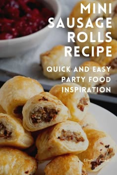 mini sausage rolls recipe on a plate with raspberries in the background and text overlay