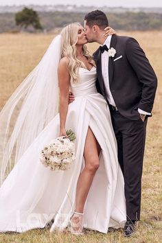 a bride and groom kissing each other in front of an open field with the caption run thru