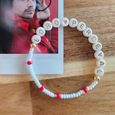 For the love of Charles! Do you love Charles Leclerc like I do? Our Lord Perceval. This friendship bracelet is for you. Lol. A subtle but fun nod to the fandom. (Polaroid not included.) This bracelet is hand made with acrylic and glass beads. They are handmade so each one is different based on the beads. The bracelet itself measures approximately 7 inches around. If you would like it sized differently, please let me know. Ferrari Friendship Bracelet, Inspirational White Handmade Friendship Bracelets, White Spiritual Bracelet For Valentine's Day, Charles Leclerc Bracelet, Bead Friendship Bracelet, Charles Leclerc Ferrari, Leclerc Ferrari