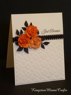 a card with orange flowers on it and the words congratulations written in black lettering below