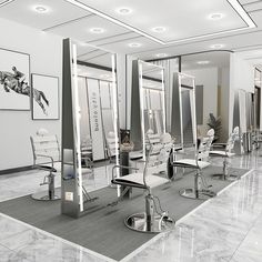 a salon with mirrors, chairs and pictures on the wall