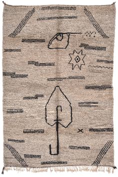 an old rug with arrows and stars on it