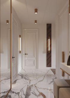 a hallway with marble floors and white walls