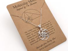 "Handcrafted from solid Sterling Silver, my Golden Ratio spiral pendant combines four Fibonacci triangles to form a swirl of aesthetic perfection! To add a unique touch, the φ symbol has been etched into the bail. This makes a great gift and statement piece for math lovers, architects, teachers or anyone else who needs a bit of geometric perfection in their life! This a copyrighted Molecular Motifs original design. You won't find this pendant anywhere else! ©2020 🔬For other science themed jewel Crochet Fibonacci, Fibonacci Shell, Fibonacci Garden, Fibonacci Stone, Golden Ratio Spiral, Fibonacci Necklace, Gift Graduation, Divine Proportion, Math Gift